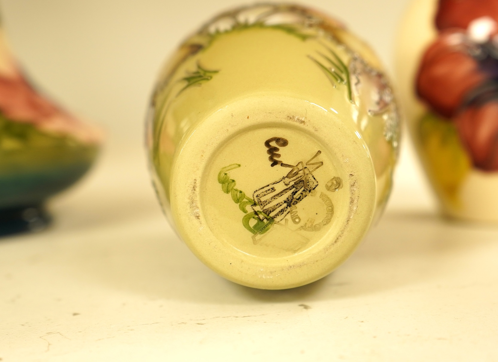 A collection of nine modern Moorcroft pieces including a Furzy Hill vase and a Toadstool vase, tallest 19cm